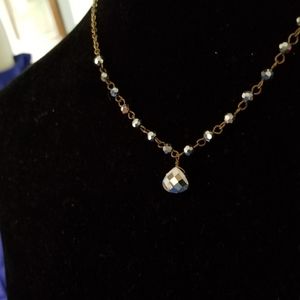 Gold chain with steel colored beads